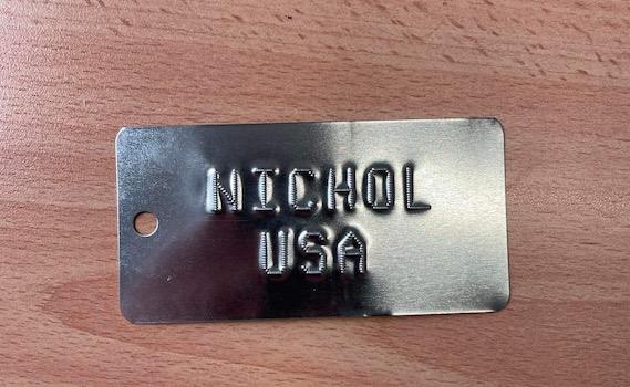 embossed tag